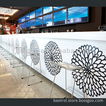Modern commercial bar counter with beautiful flower craving